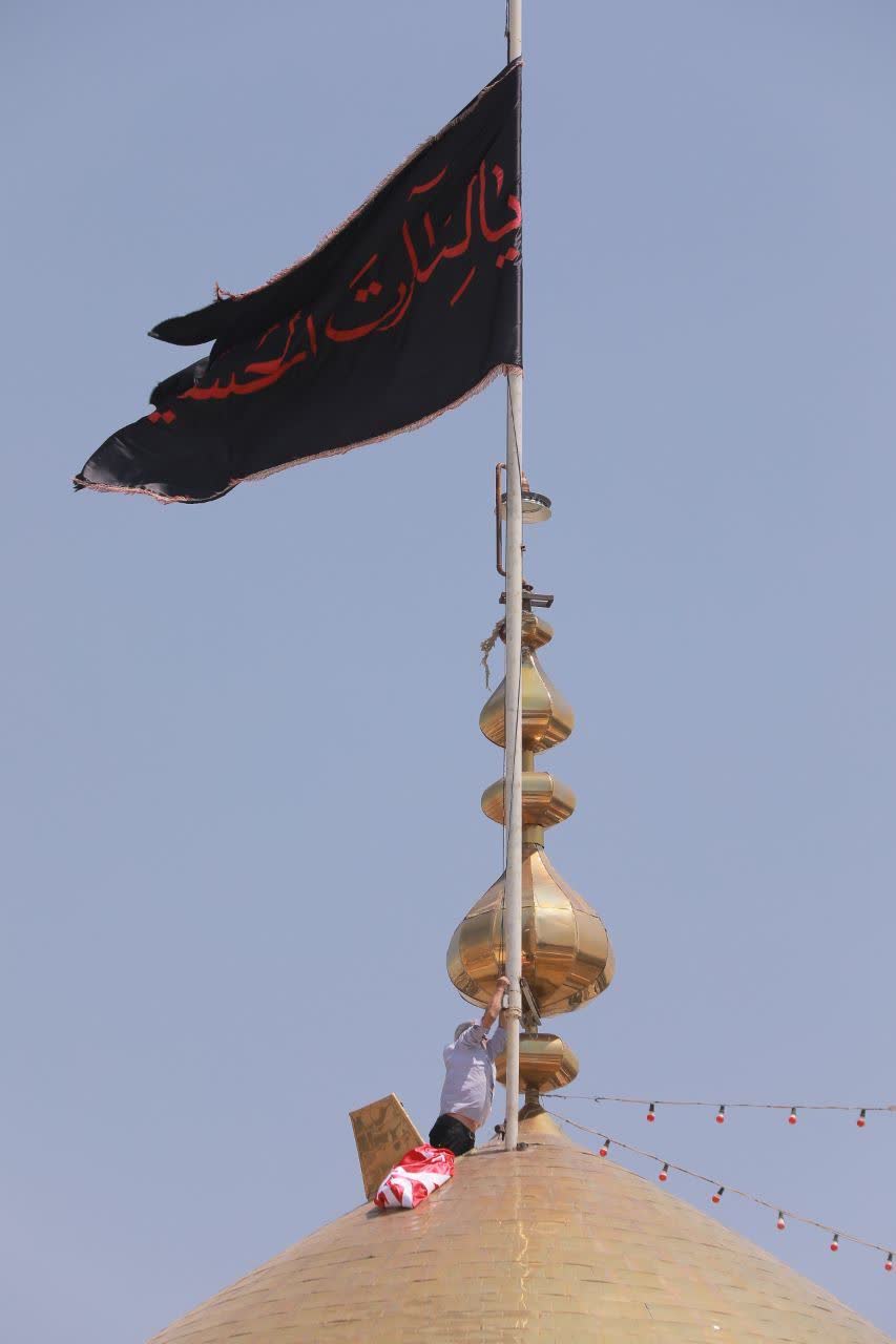 آیین تعویض پرچم گنبد حسینیه اعظم زنجان